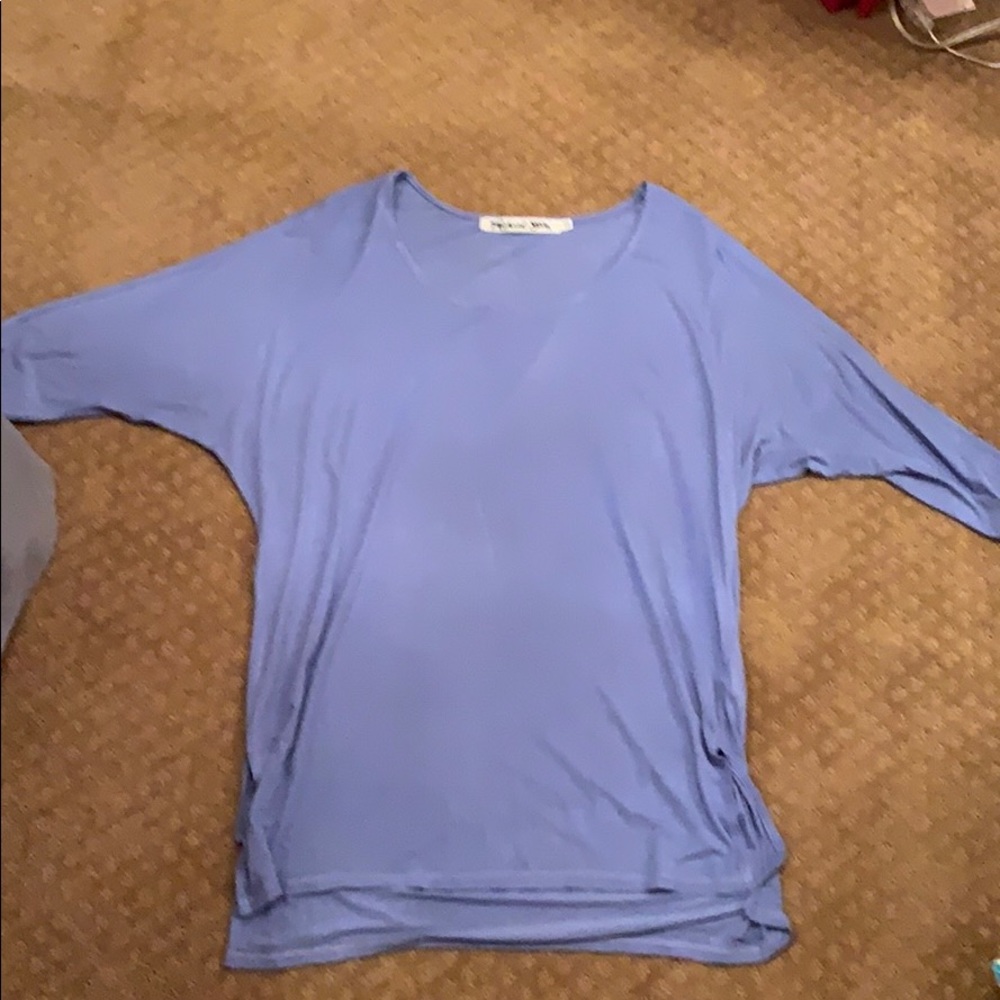 Blue shirt.